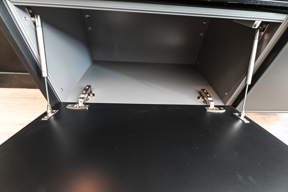 Nolte Küchen Modern Black Kitchen with Unique Accent Wall Cabinetry