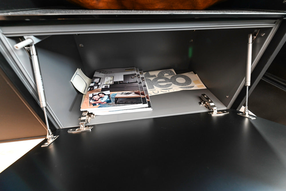 Nolte Küchen Modern Black Kitchen with Unique Accent Wall Cabinetry