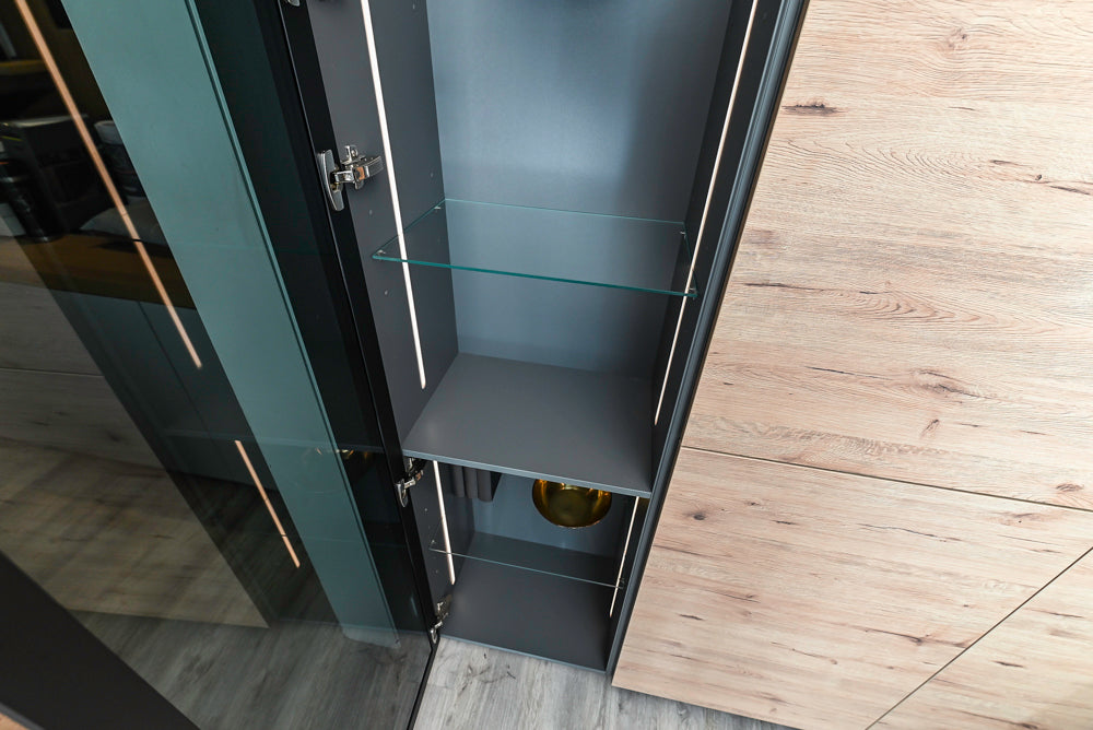 Nolte Küchen Modern Black Kitchen with Unique Accent Wall Cabinetry