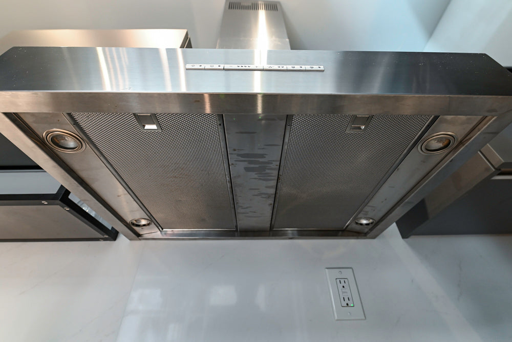 Modern Dark Grey Kitchenette with Quartz Countertops and Miele Appliances