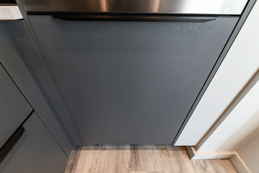 Modern Dark Grey Kitchenette with Quartz Countertops and Miele Appliances