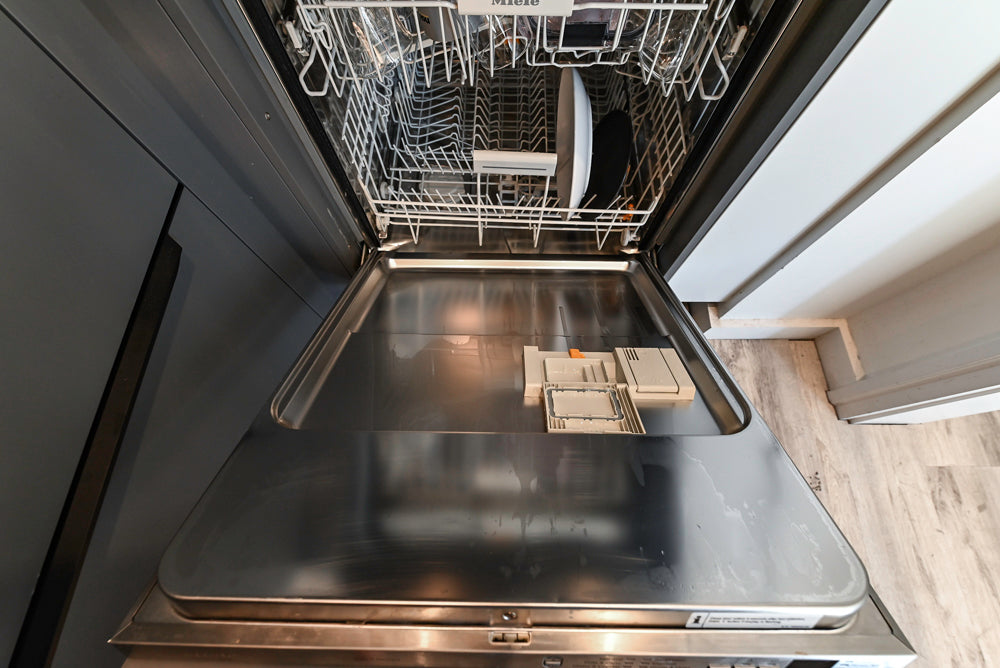 Modern Dark Grey Kitchenette with Quartz Countertops and Miele Appliances