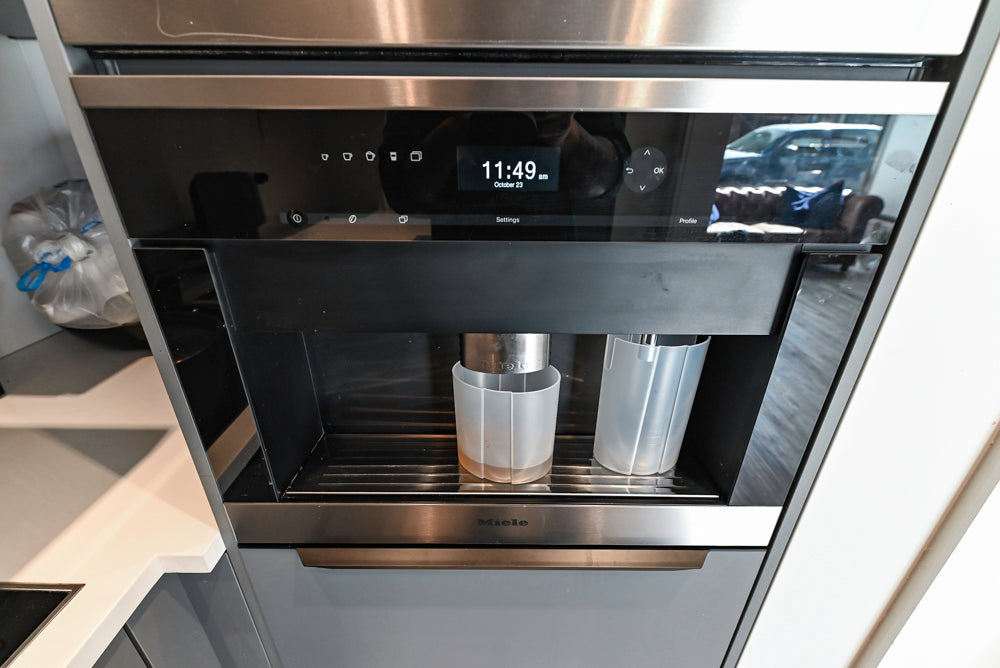 Modern Dark Grey Kitchenette with Quartz Countertops & Miele Appliances