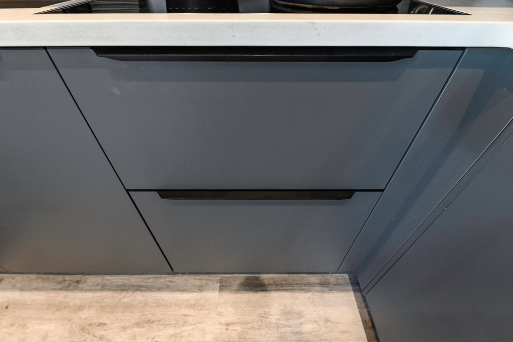 Modern Dark Grey Kitchenette with Quartz Countertops & Miele Appliances