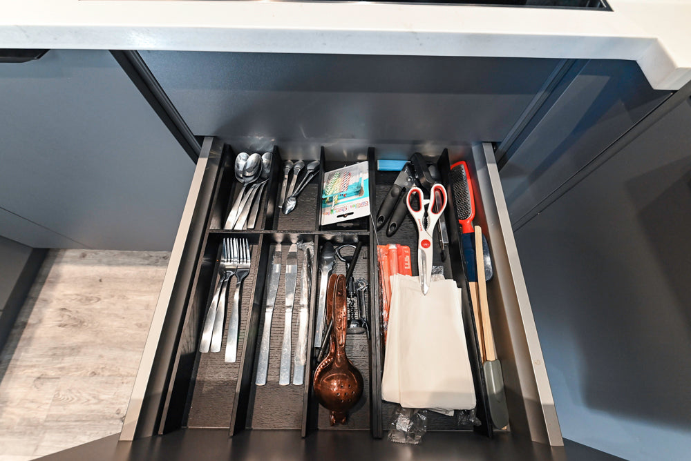 Modern Dark Grey Kitchenette with Quartz Countertops & Miele Appliances