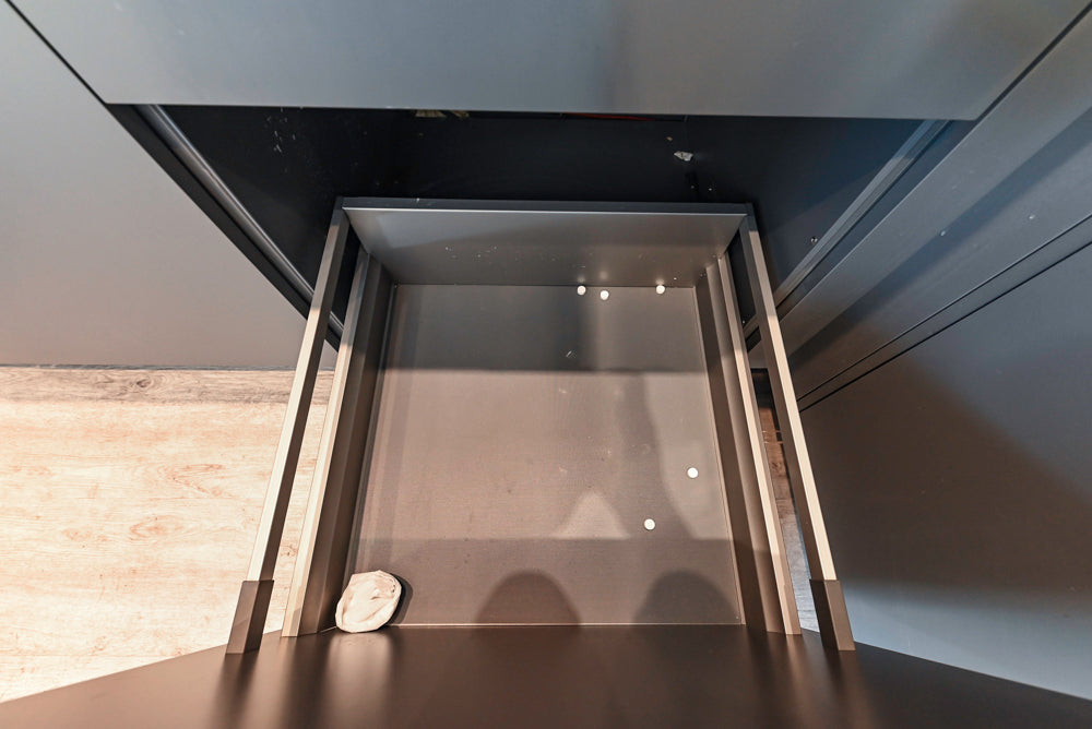 Modern Dark Grey Kitchenette with Quartz Countertops & Miele Appliances