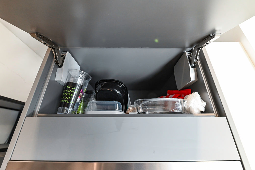 Modern Dark Grey Kitchenette with Quartz Countertops & Miele Appliances