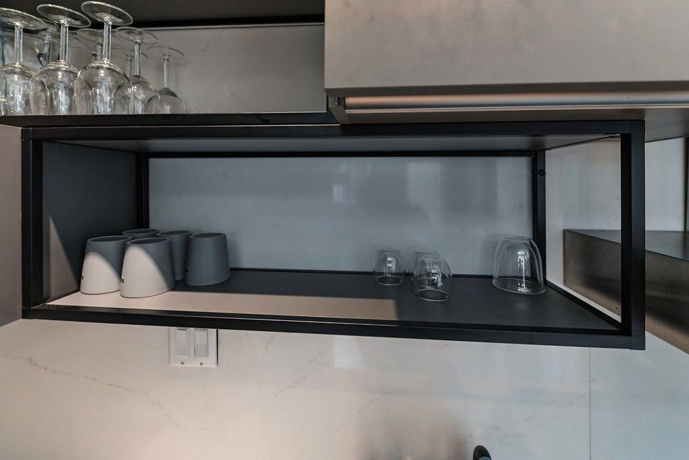 Modern Dark Grey Kitchenette with Quartz Countertops & Miele Appliances