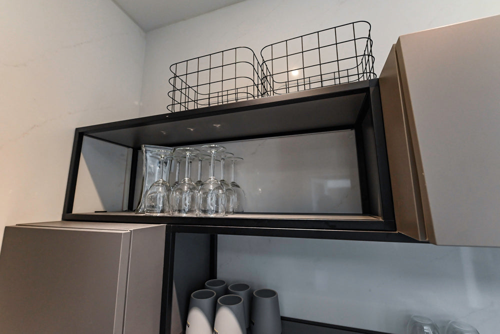 Modern Dark Grey Kitchenette with Quartz Countertops & Miele Appliances