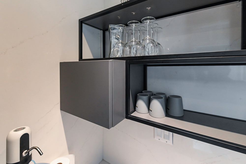 Modern Dark Grey Kitchenette with Quartz Countertops & Miele Appliances