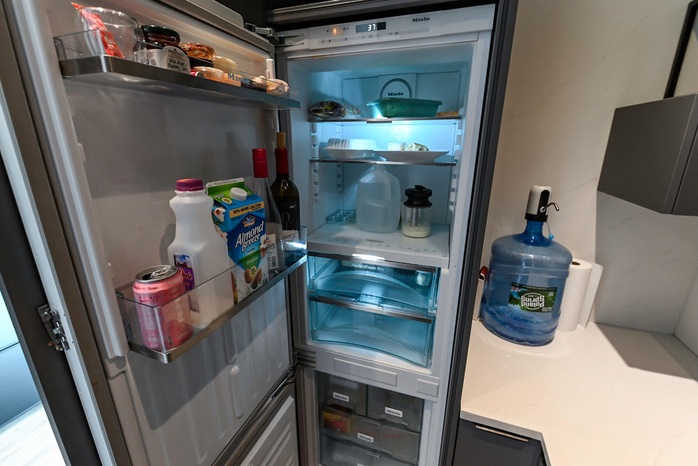 Modern Dark Grey Kitchenette with Quartz Countertops and Miele Appliances