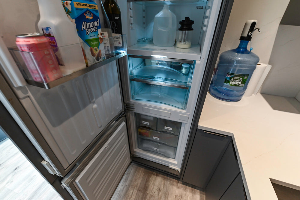 Modern Dark Grey Kitchenette with Quartz Countertops and Miele Appliances