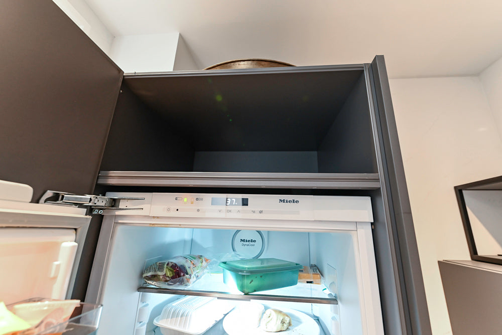 Modern Dark Grey Kitchenette with Quartz Countertops and Miele Appliances