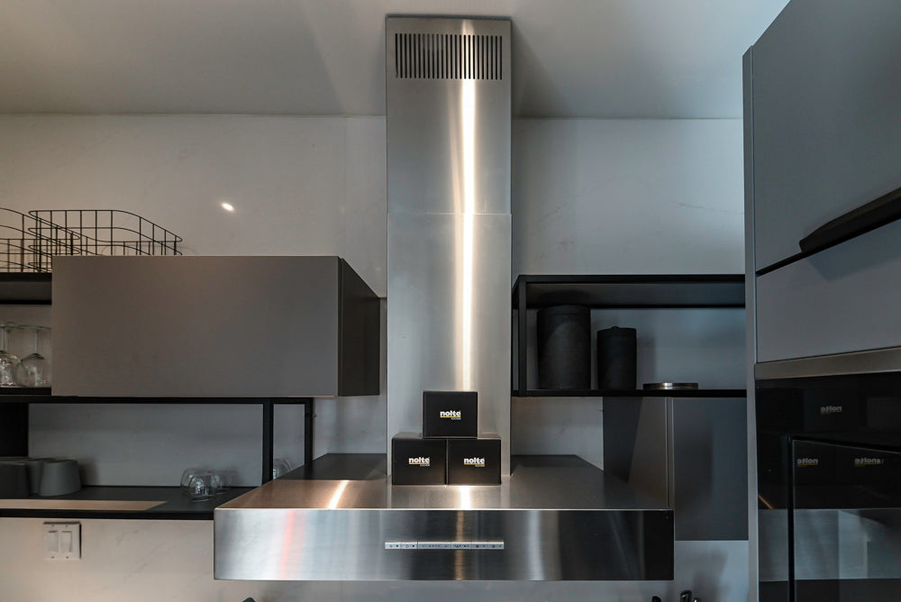 Modern Dark Grey Kitchenette with Quartz Countertops and Miele Appliances