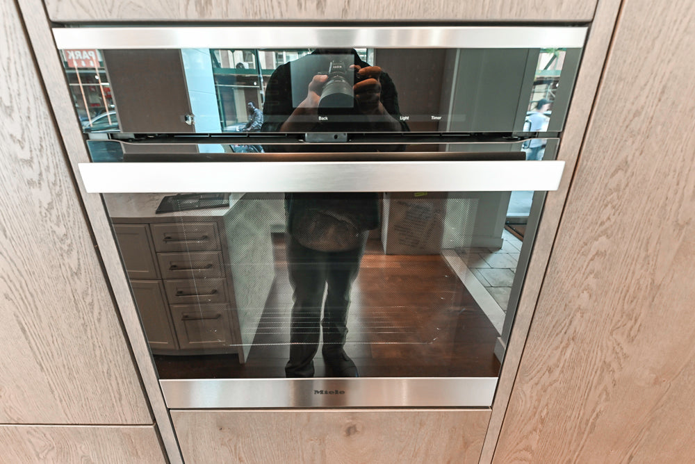 Nolte Küchen Classic Modern White Kitchen with Quartz Countertops & Luxe Appliances