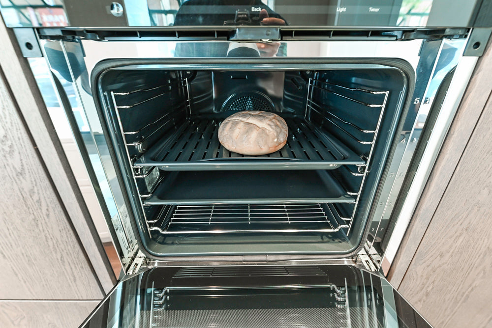 Nolte Küchen Classic Modern White Kitchen with Quartz Countertops & Luxe Appliances