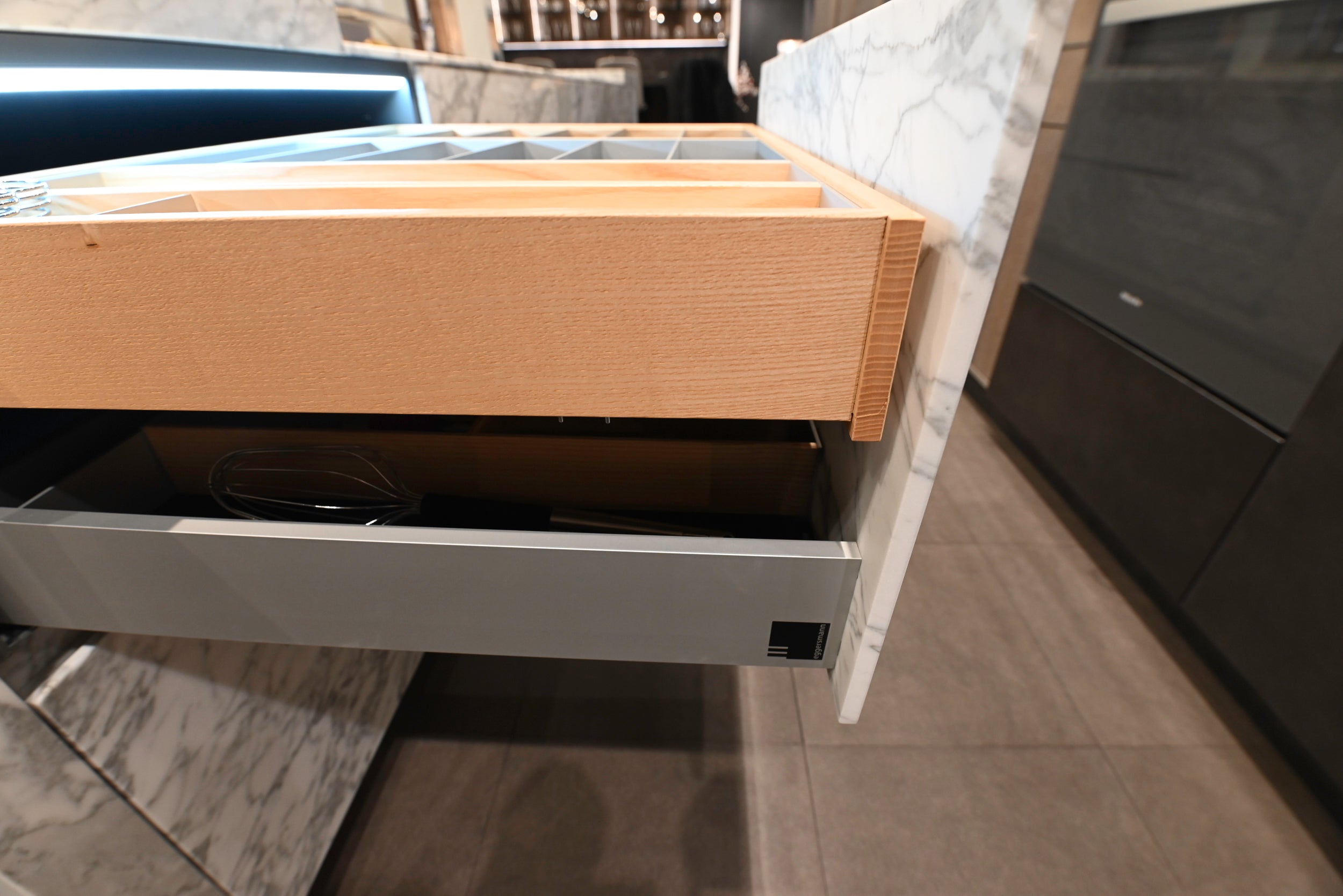 eggersmann USA Chablis Vintage Oak & Steel Grey Modern Kitchen with Arabescato Waterfall Island and Miele Appliance Suite