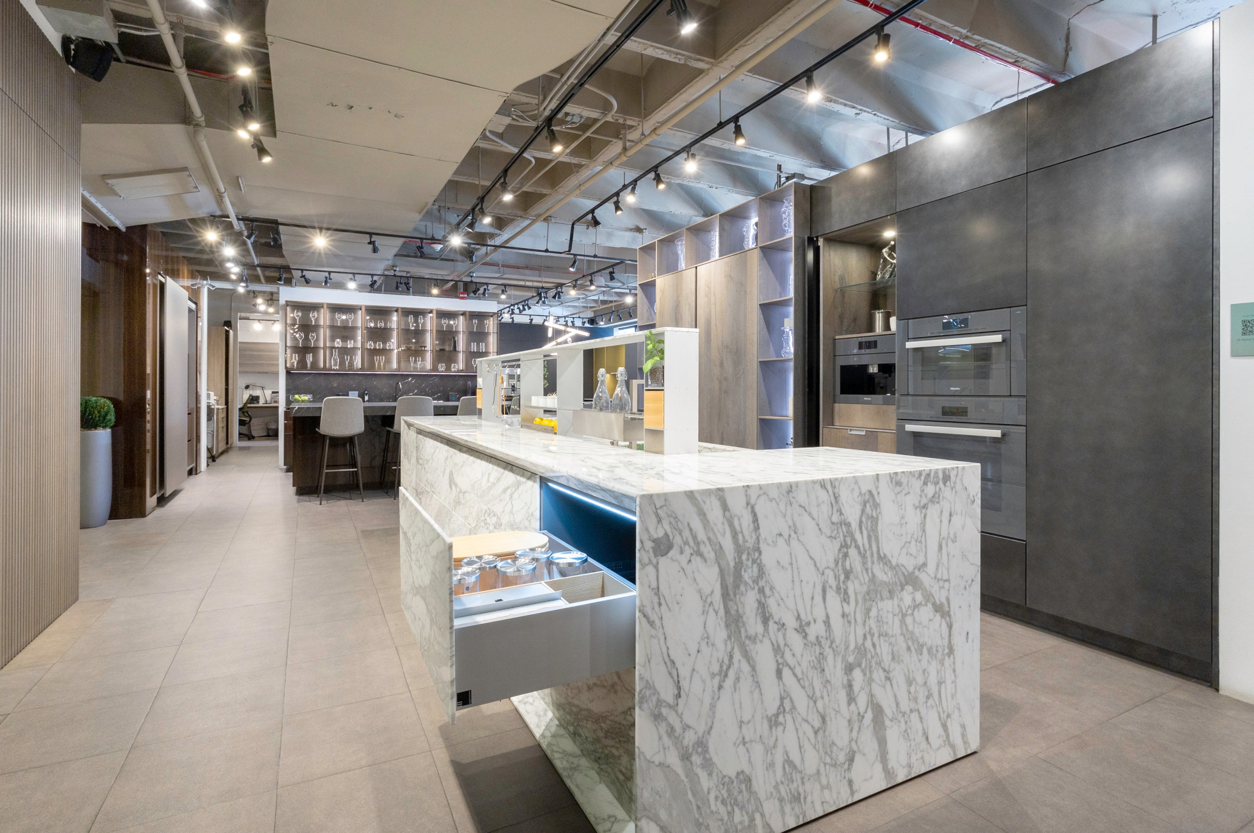 eggersmann USA Chablis Vintage Oak & Steel Grey Modern Kitchen with Arabescato Waterfall Island and Miele Appliance Suite