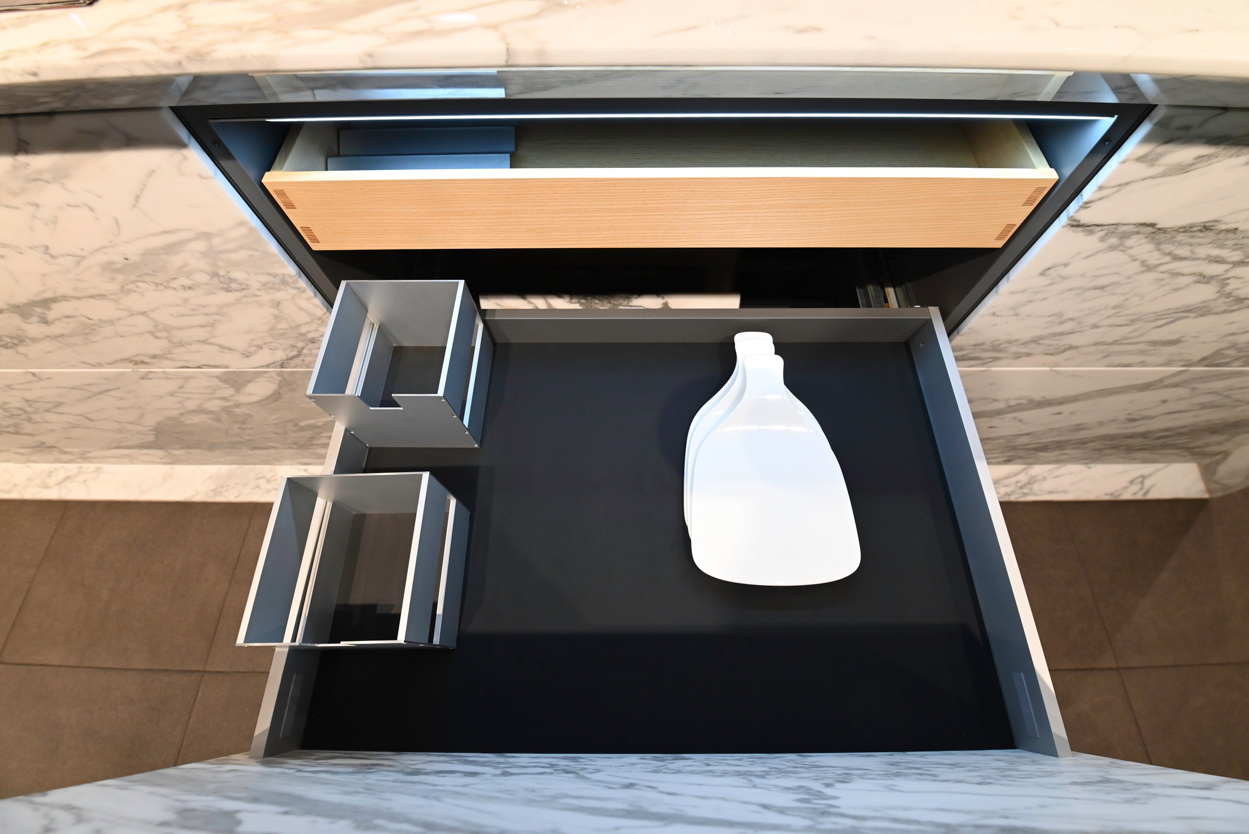 eggersmann USA Chablis Vintage Oak & Steel Grey Modern Kitchen with Arabescato Waterfall Island and Miele Appliance Suite