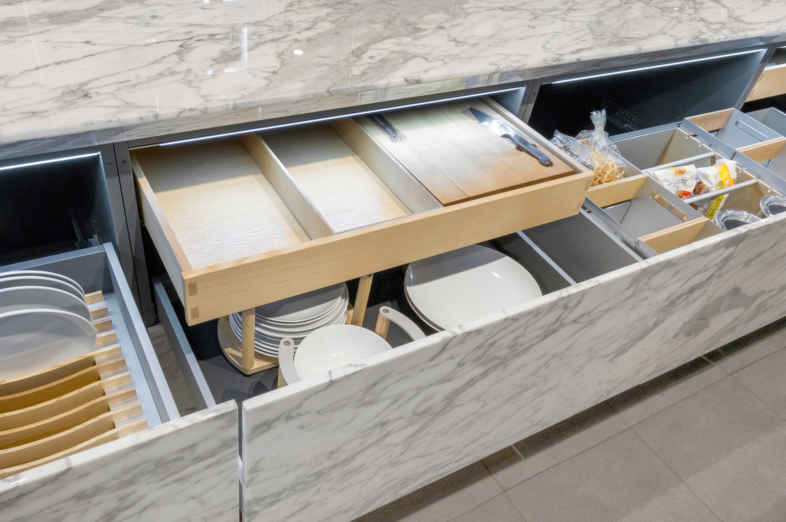 eggersmann USA Chablis Vintage Oak & Steel Grey Modern Kitchen with Arabescato Waterfall Island and Miele Appliance Suite