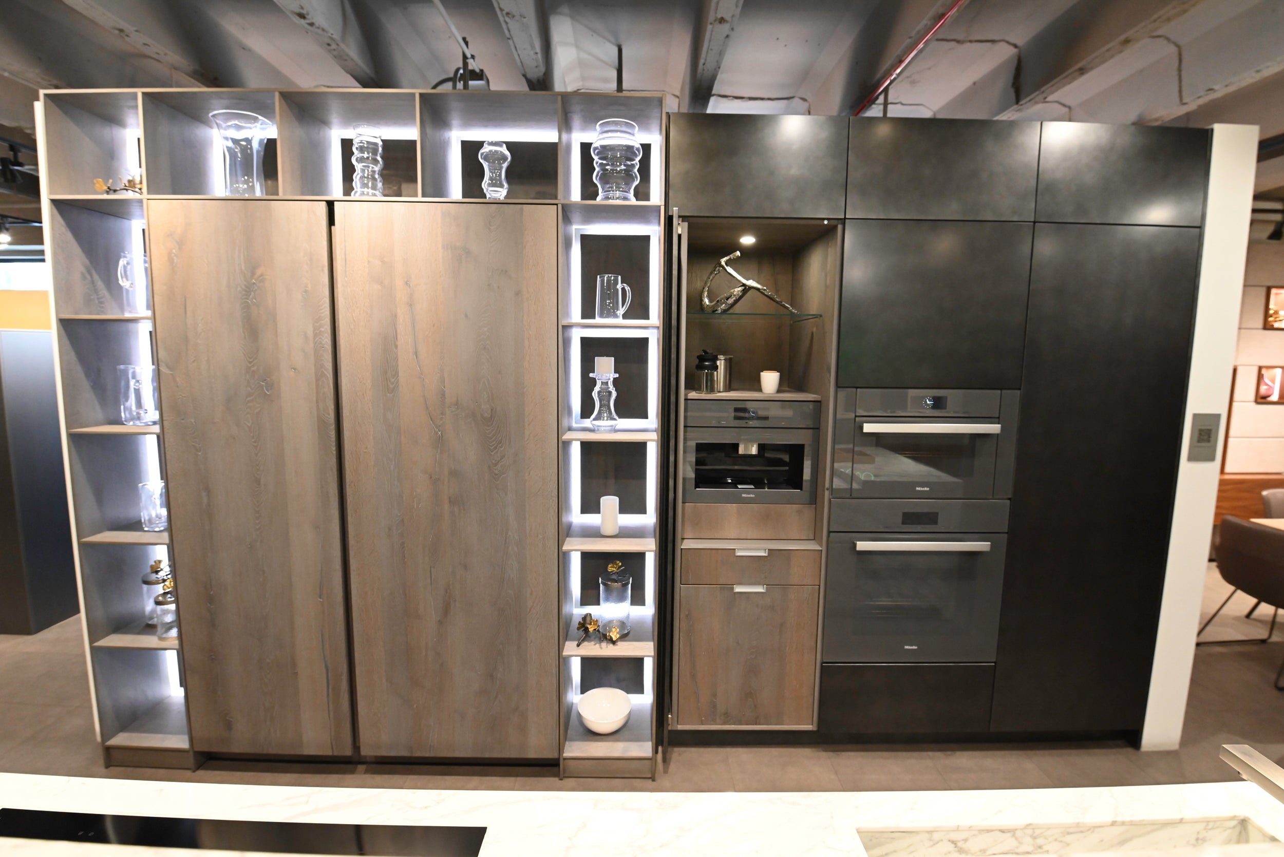 eggersmann USA Chablis Vintage Oak & Steel Grey Modern Kitchen with Arabescato Waterfall Island and Miele Appliance Suite