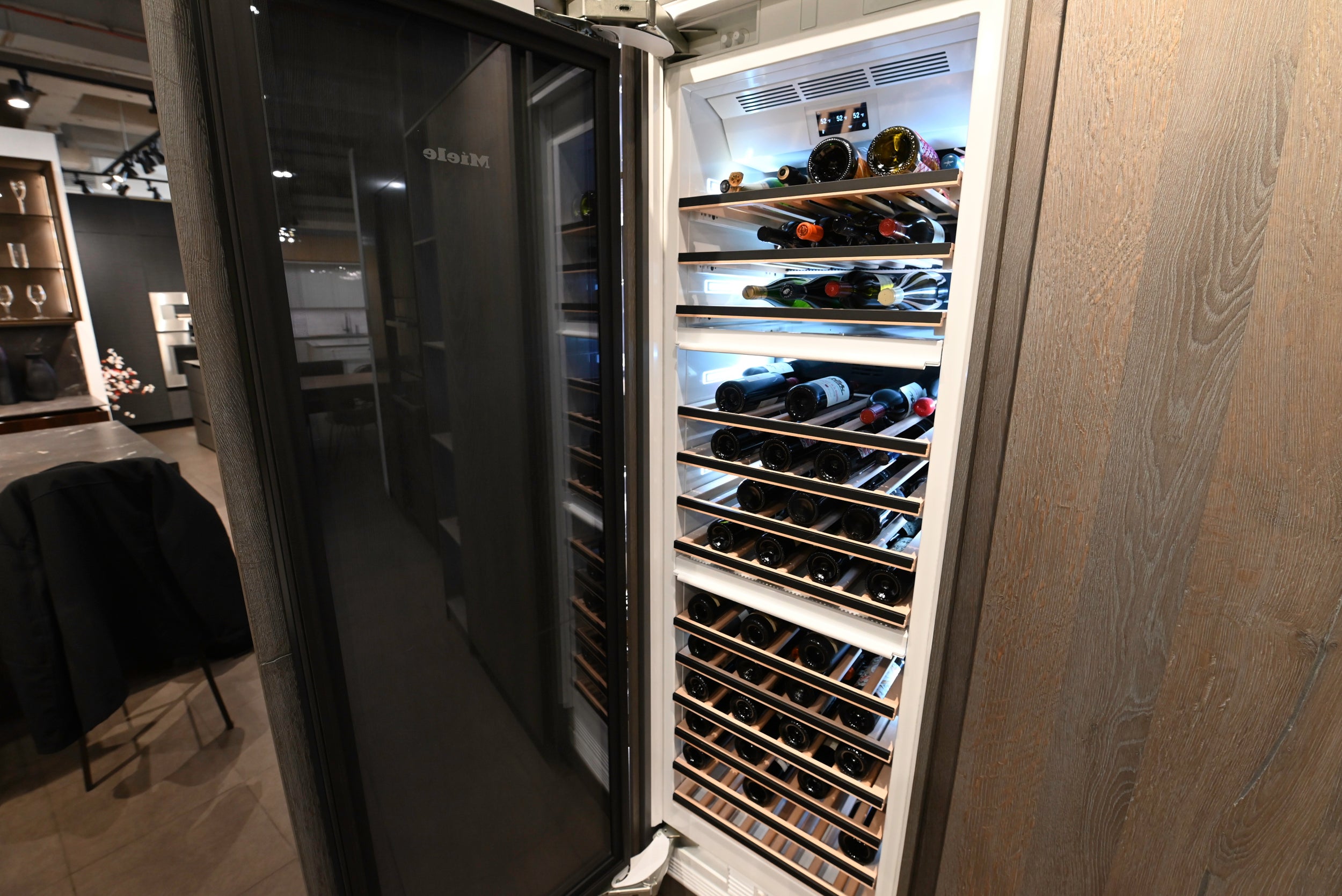 eggersmann USA Chablis Vintage Oak & Steel Grey Modern Kitchen with Arabescato Waterfall Island and Miele Appliance Suite