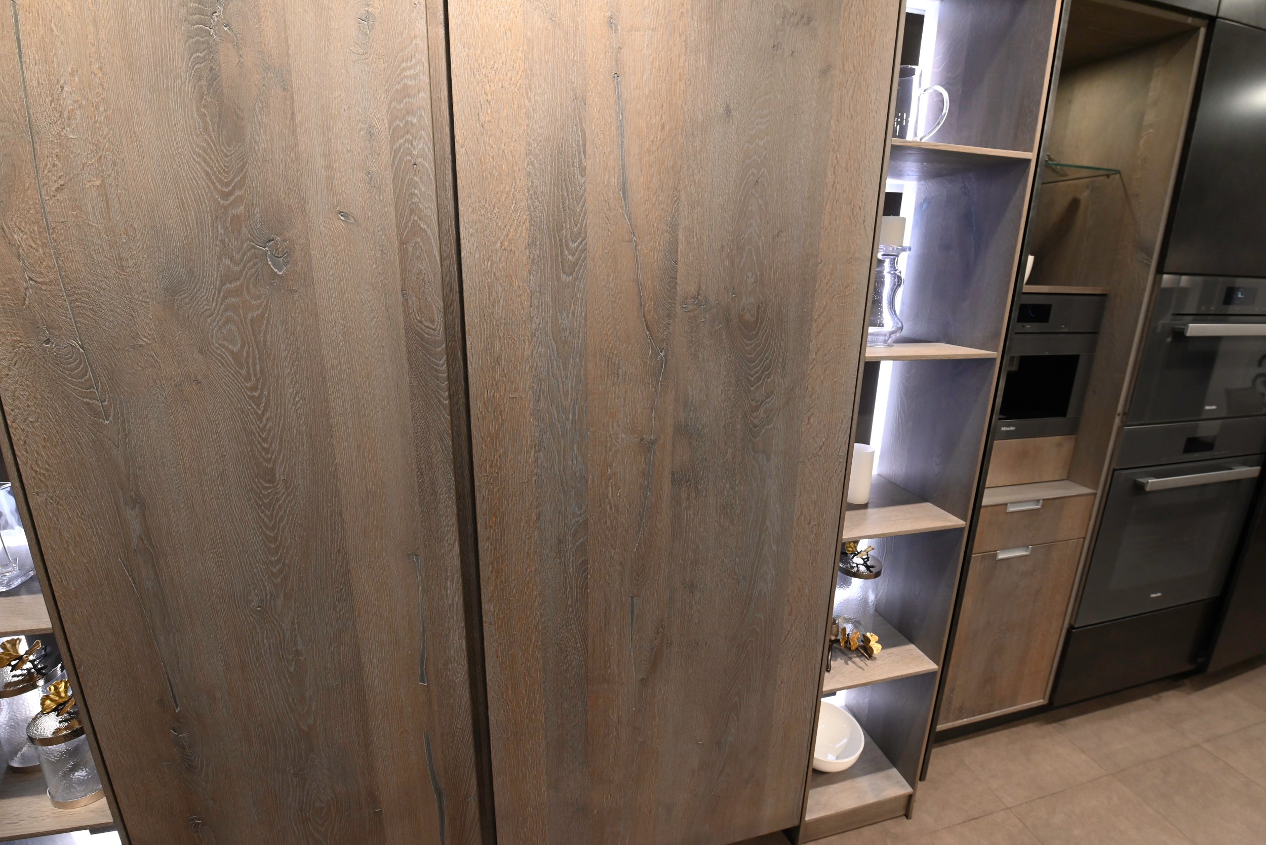 eggersmann USA Chablis Vintage Oak & Steel Grey Modern Kitchen with Arabescato Waterfall Island and Miele Appliance Suite