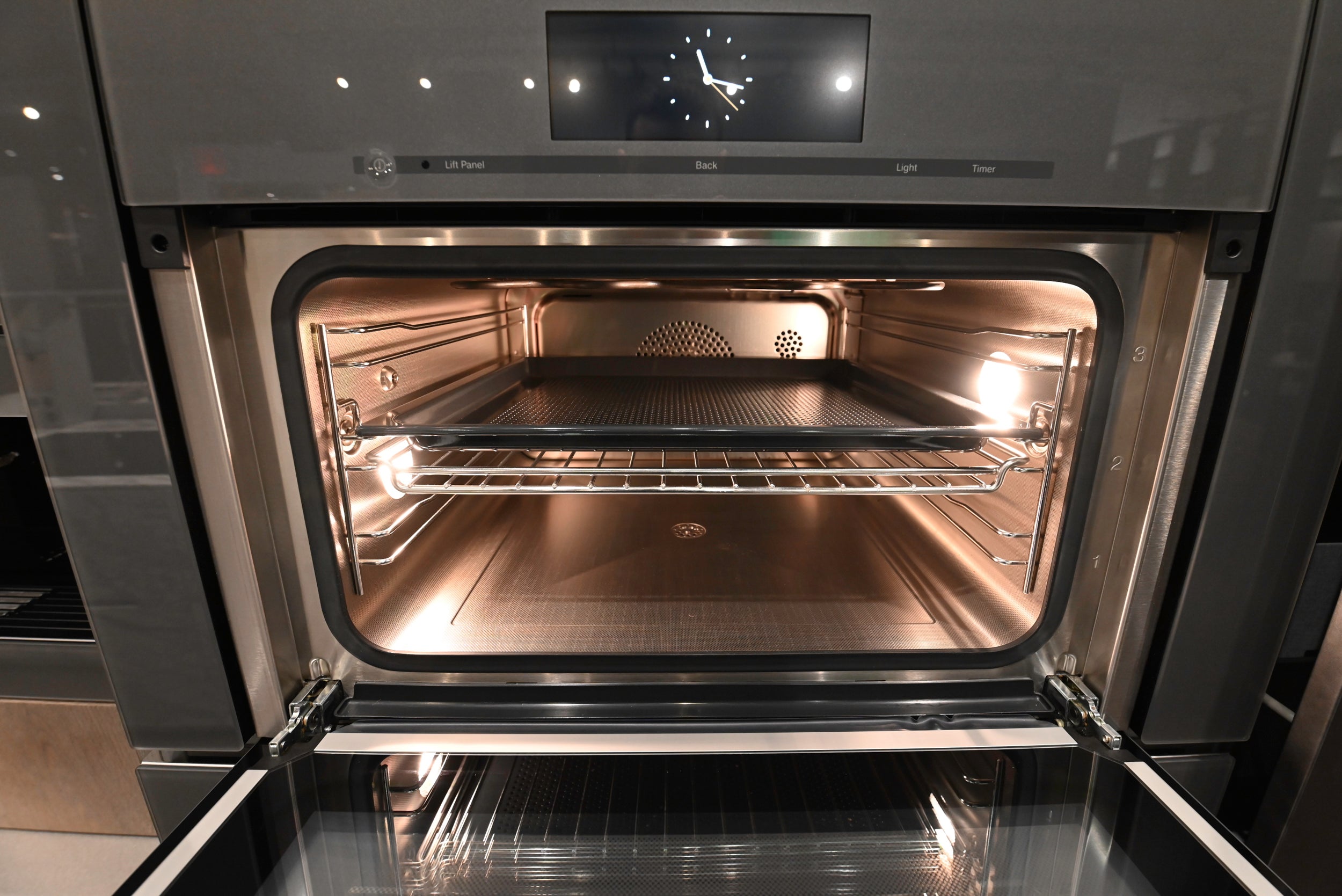 eggersmann USA Chablis Vintage Oak & Steel Grey Modern Kitchen with Arabescato Waterfall Island and Miele Appliance Suite
