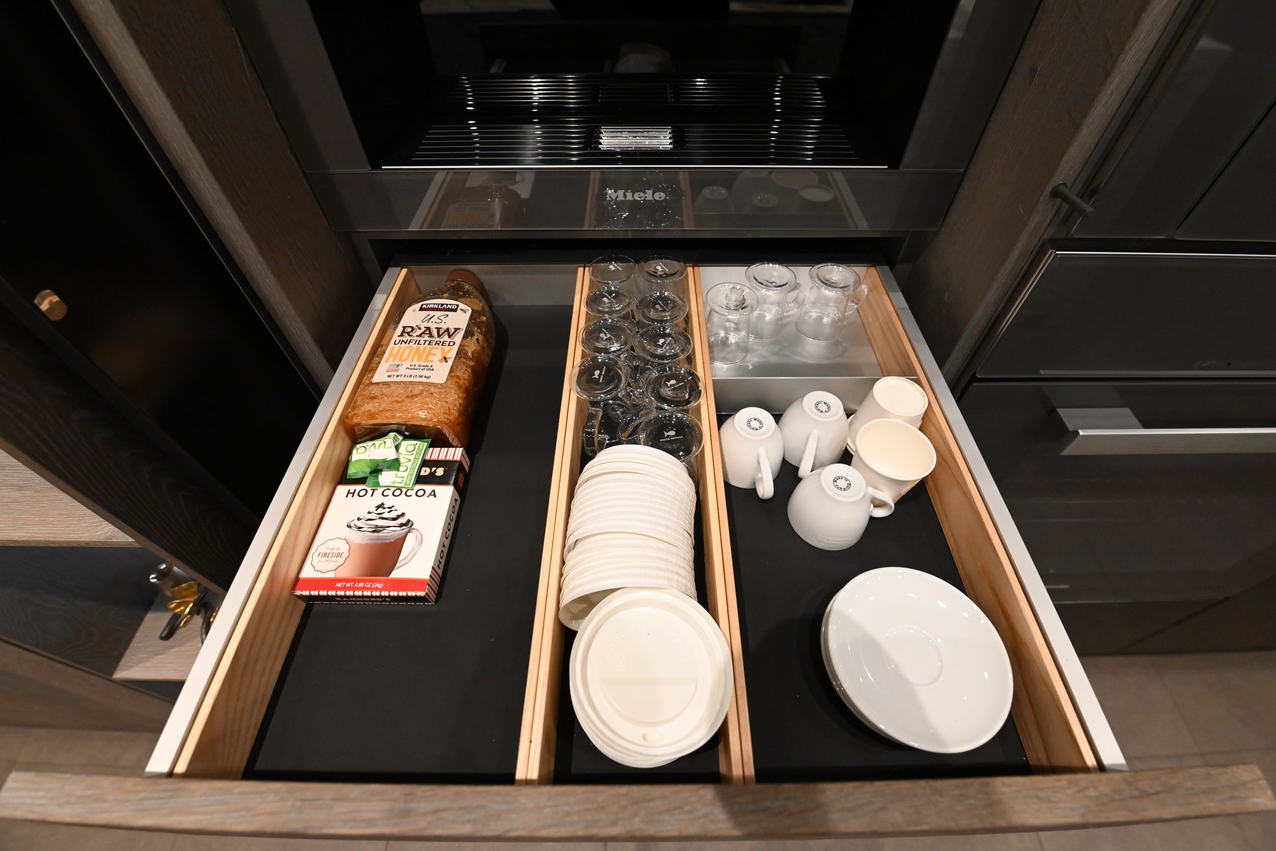 eggersmann USA Chablis Vintage Oak & Steel Grey Modern Kitchen with Arabescato Waterfall Island and Miele Appliance Suite