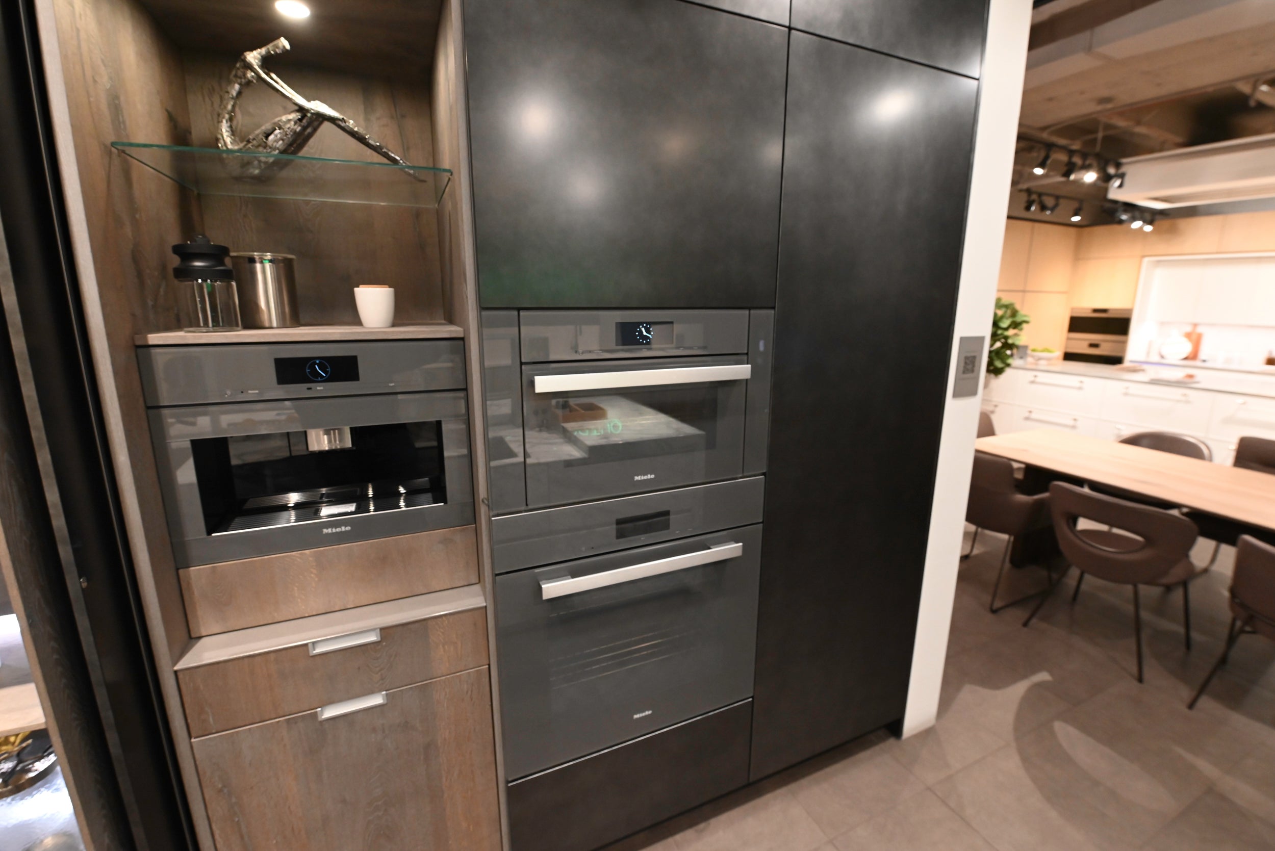 eggersmann USA Chablis Vintage Oak & Steel Grey Modern Kitchen with Arabescato Waterfall Island and Miele Appliance Suite