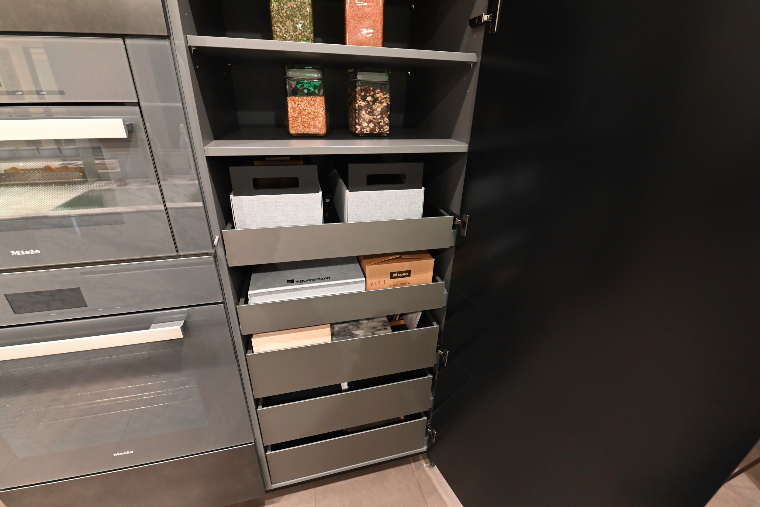 eggersmann USA Chablis Vintage Oak & Steel Grey Modern Kitchen with Arabescato Waterfall Island and Miele Appliance Suite
