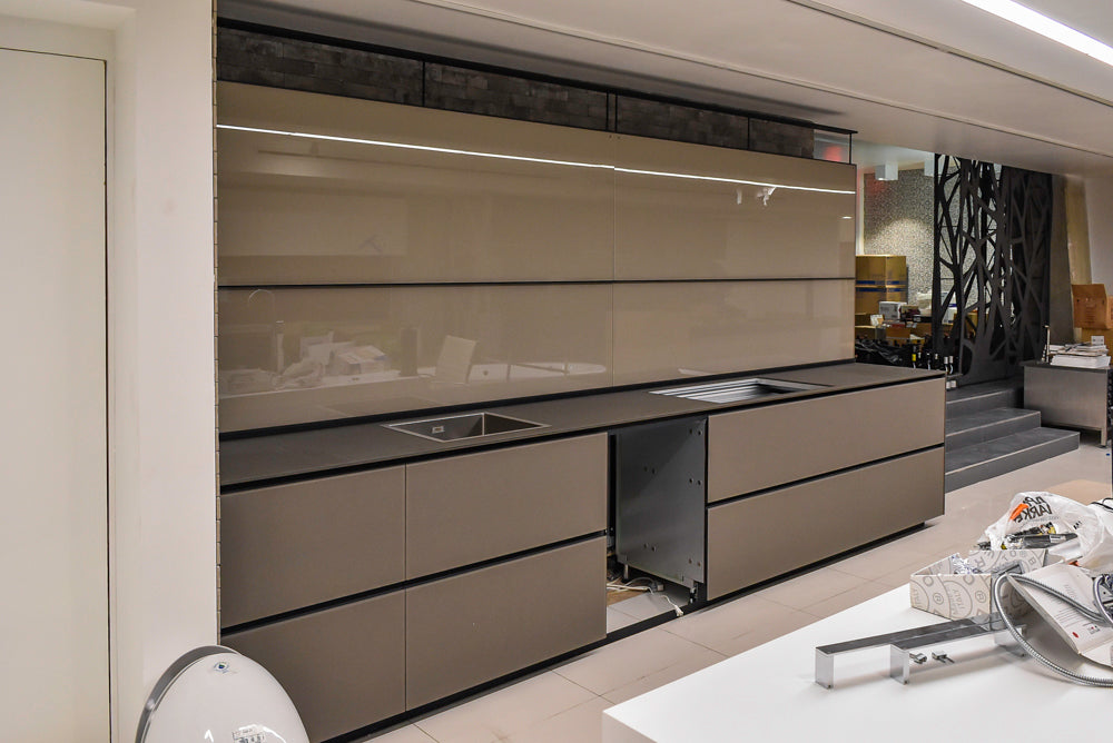 Valcucine Modern Minimalist Brown Toned Kitchen with Glass Countertops