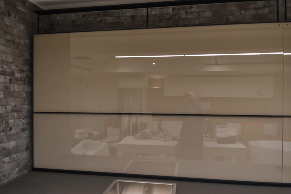 Valcucine Modern Minimalist Brown Toned Kitchen with Glass Countertops