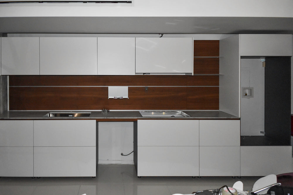 Valcucine Modern Glossy White Kitchen with Marble Countertops