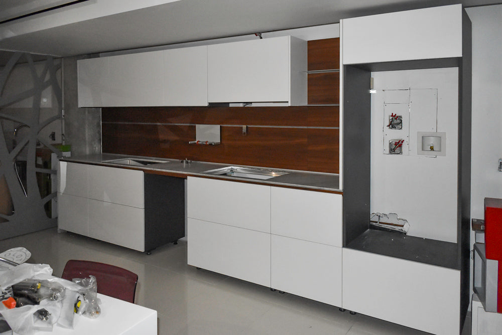 Valcucine Modern Glossy White Kitchen with Marble Countertops