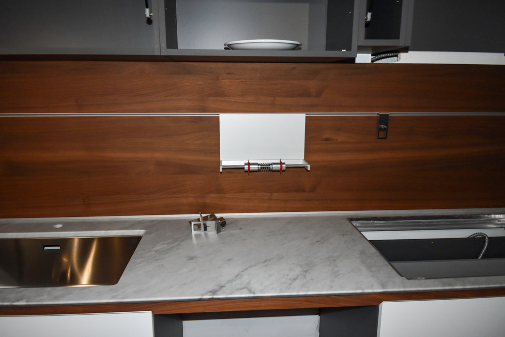 Valcucine Modern Glossy White Kitchen with Marble Countertops