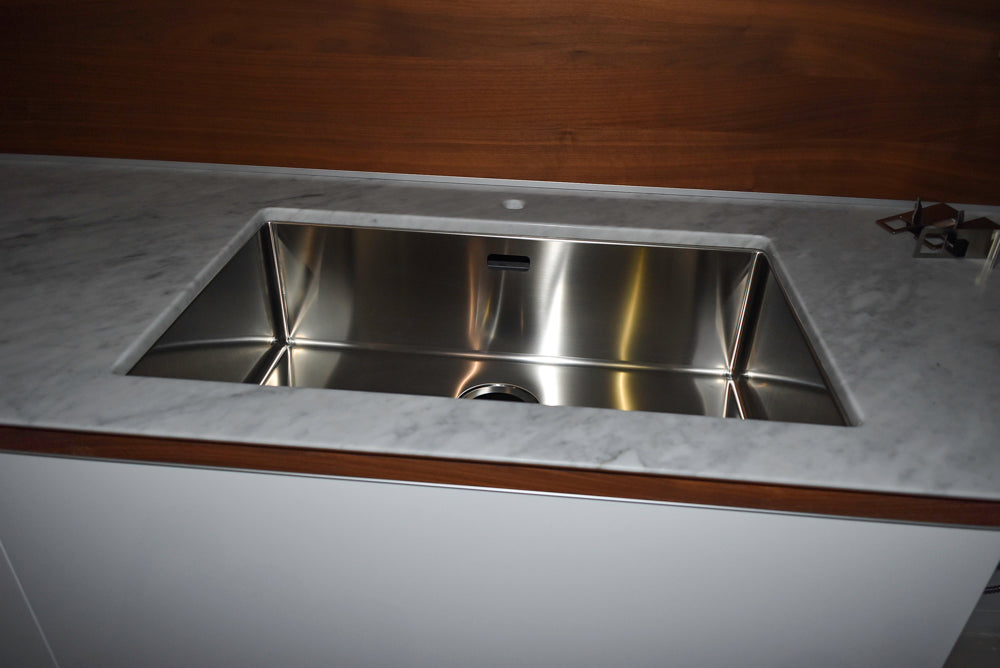 Valcucine Modern Glossy White Kitchen with Marble Countertops