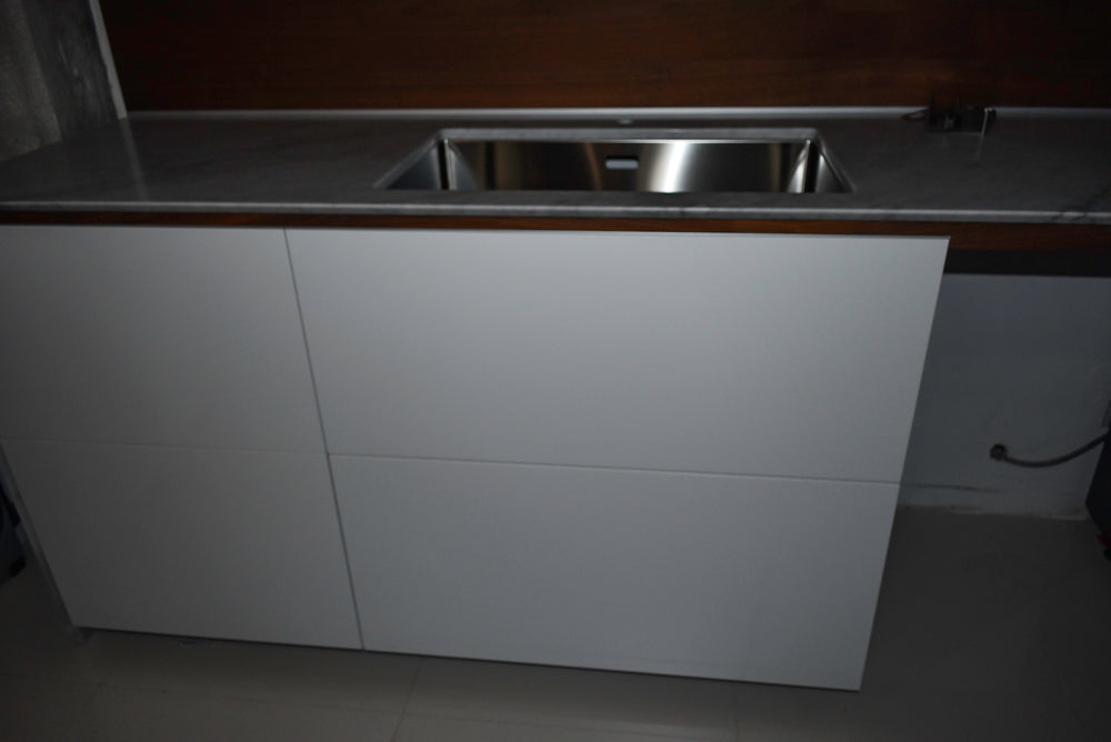 Valcucine Modern Glossy White Kitchen with Marble Countertops