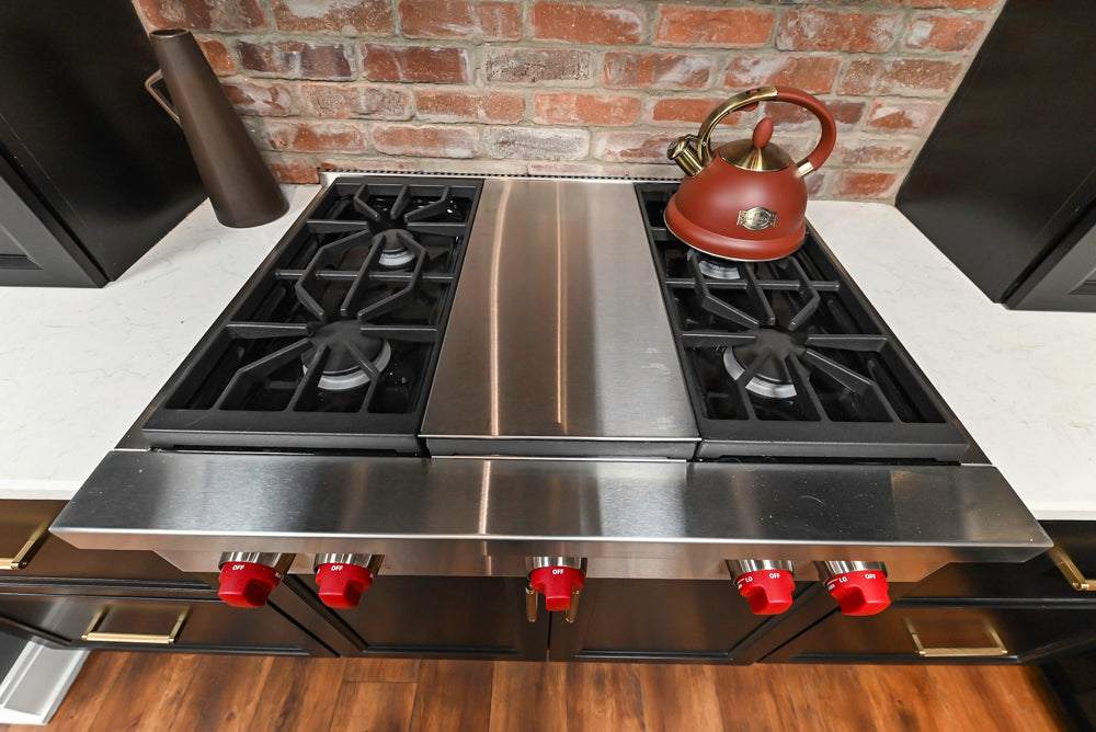 Showplace Black and White Industrial Kitchen with Island and Bonus Bench Area
