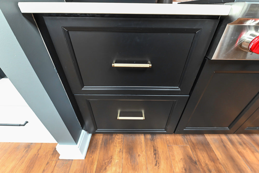 Showplace Black and White Industrial Kitchen with Island and Bonus Bench Area