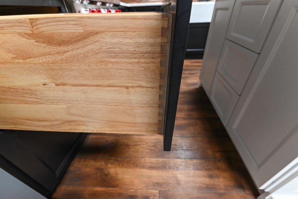 Showplace Black and White Industrial Kitchen with Island and Bonus Bench Area