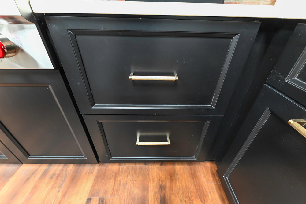 Showplace Black and White Industrial Kitchen with Island and Bonus Bench Area