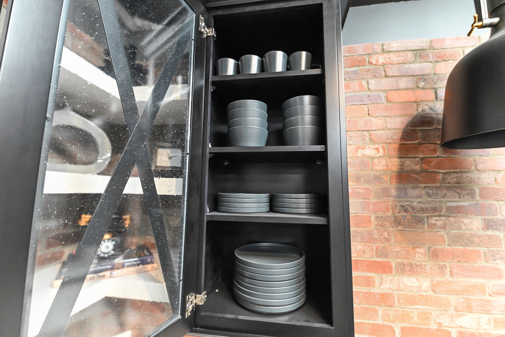 Showplace Black and White Industrial Kitchen with Island and Bonus Bench Area