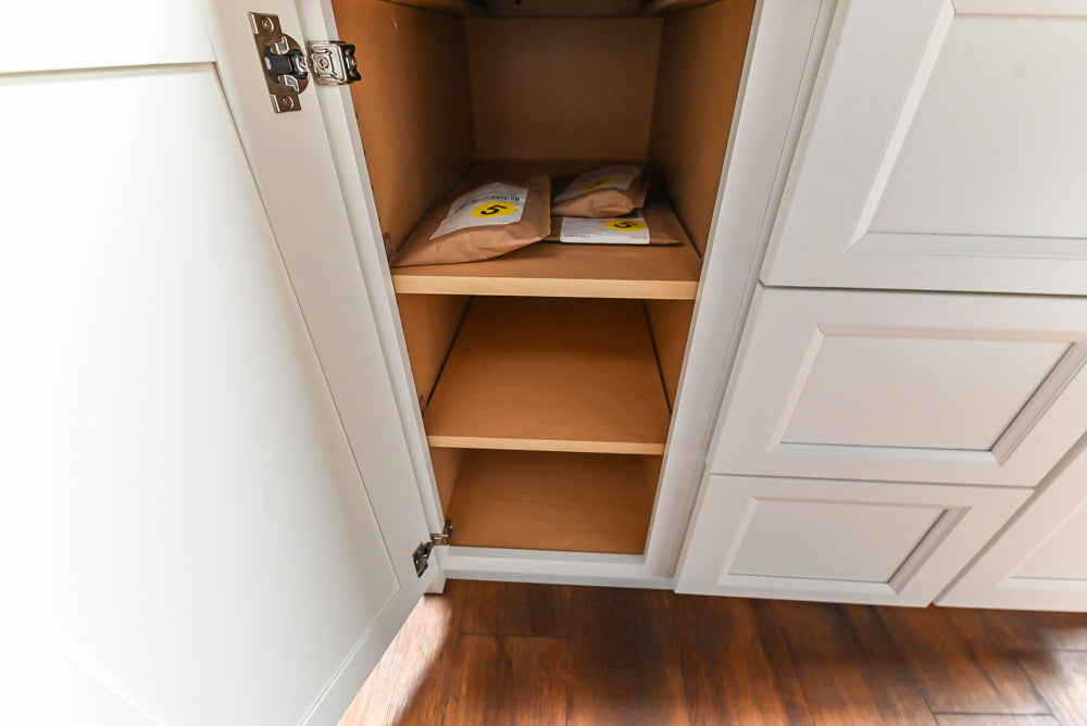 Showplace Black and White Industrial Kitchen with Island and Bonus Bench Area