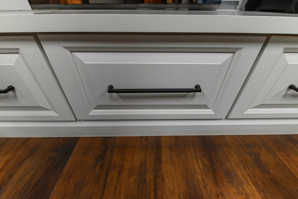 Showplace Black and White Industrial Kitchen with Island and Bonus Bench Area