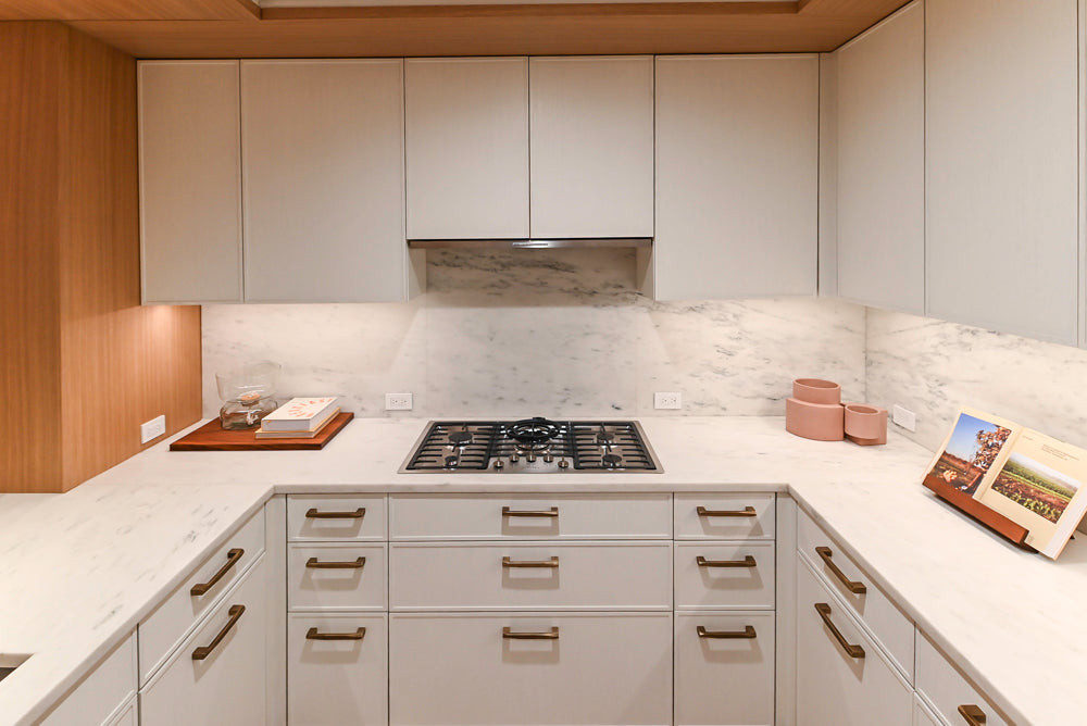 Smallbone Transitional White Oak Kitchen with Marble Countertops & Miele Appliances