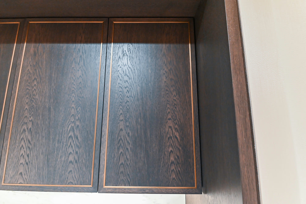 Transitional Dark Brown Wood Veneer Pantry with White Marble Countertops