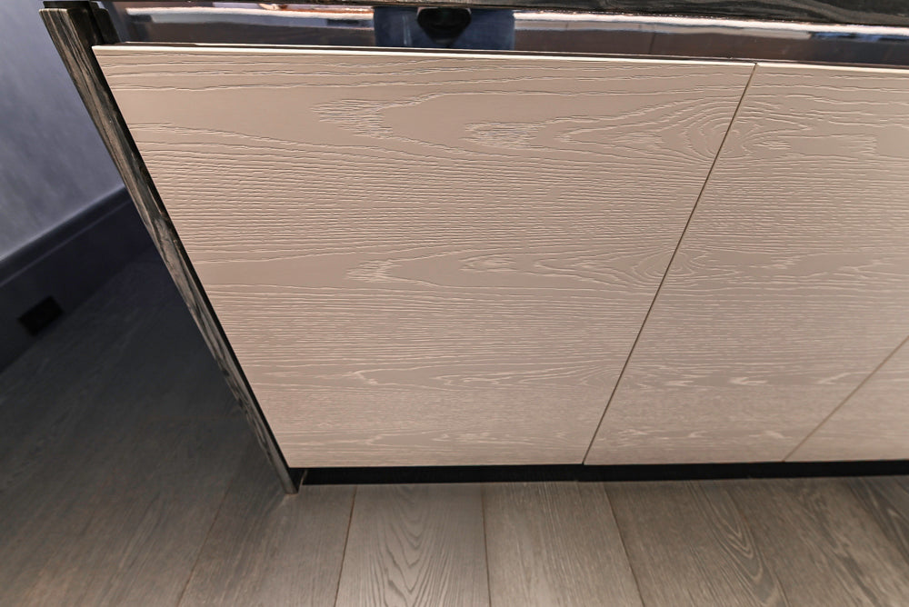 Modern White and Brown Wood Veneer Kitchen with Waterfall Island, Marble Countertops & Miele Appliances