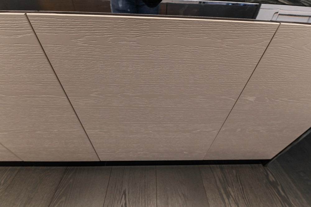 Modern White and Brown Wood Veneer Kitchen with Waterfall Island, Marble Countertops & Miele Appliances