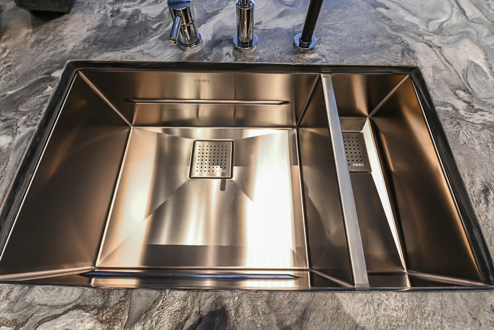 Modern White and Brown Wood Veneer Kitchen with Waterfall Island, Marble Countertops & Miele Appliances